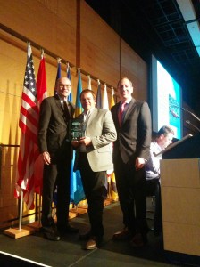 Maine DOT' Director David Bernhardt and AASHTO Vice President accepts the award for his state's project.